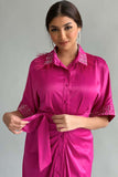 Pleated shirt dress decorated with crystals and feathers in fuchsia