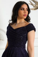 Mid-length evening dress decorated with navy blue sequins