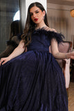 Navy blue evening dress decorated with feathers