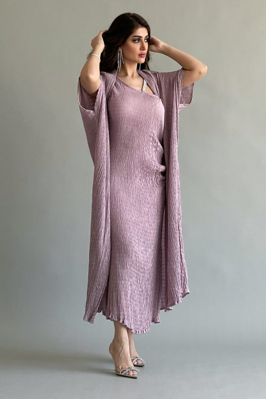 An elegant two-piece jalabiya with modern details, mauve color