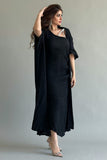 An elegant two-piece jalabiya with modern details, black color