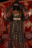 Jalabiya with a traditional design with a black bisht 