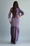 Pleated satin dress decorated with a crystal ribbon and mauve feathers