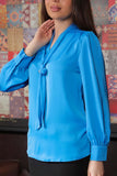 Wide blouse with tie, turquoise color