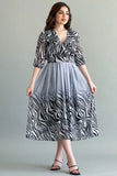 Gray chiffon dress with wavy patterns