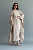 A plain two-piece galabiya with a bisht embroidered with golden threads, beige color