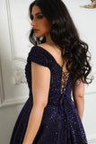 Mid-length evening dress decorated with navy blue sequins