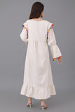 Linen robe embroidered and decorated with colorful tassels 