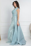 One shoulder embroidered evening dress in Tiffany color