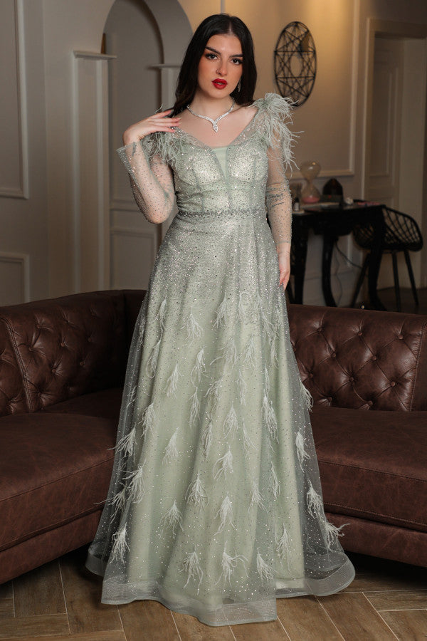 Light green feather-embellished off-shoulder evening dress