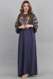 Embroidered oriental galabiya decorated with tassels and navy beads 