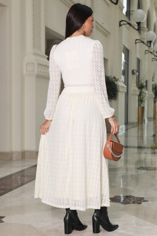 White lace sweater dress with belt at the waist 