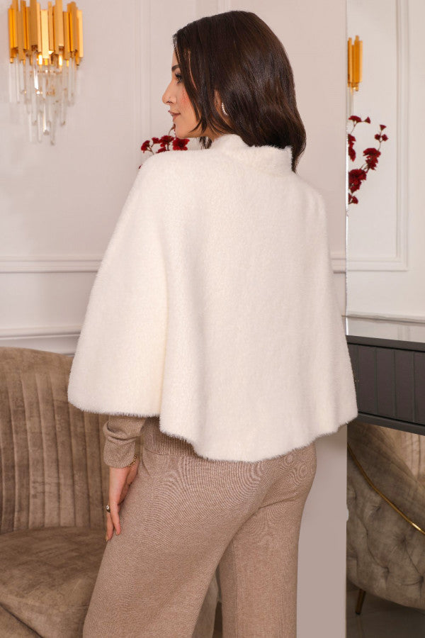 Elegant winter shawl with a white brooch 