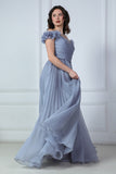 Gray evening dress with ruffle sleeves