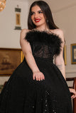 Top evening dress decorated with black tricot