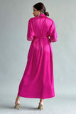 Pleated shirt dress decorated with crystals and feathers in fuchsia
