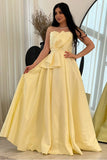 Yellow evening dress with a bow