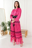 A set with a belt and pattern decorated with fuchsia fringe