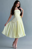 Yellow evening dress with pleated sequins