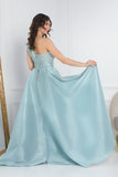 One shoulder embroidered evening dress in Tiffany color