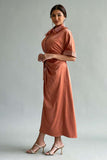 Pleated shirt dress decorated with crystals and orange feathers