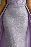 Evening dress embroidered with a mauve train design