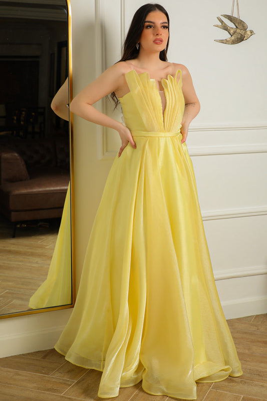 Yellow pleated strapless evening dress