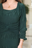 Green stretch dress with long sleeves 