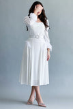 White midi dress with side slits and feathers